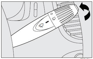 On certain versions, pulling the stalk towards the dashboard, with just one movement