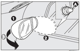 From the passenger compartment, use knob (A) to make the required adjustments.