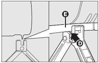 ❒ Fit the handle and operate it to partially open the jack. Position the jack