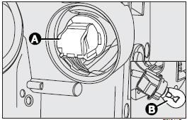 To change the bulb, remove the protective cover (3), turn connector (A) clockwise