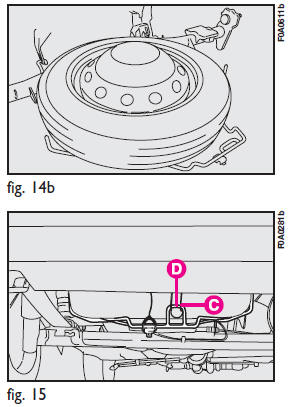 3) Put the jack and tools back in the tool bag.